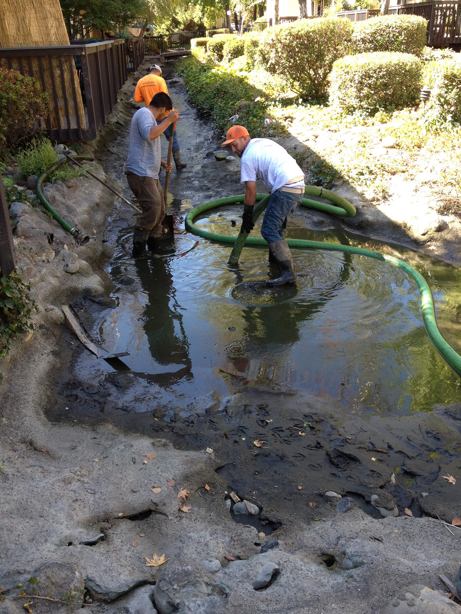 Anderson crew pumping out a flooded septic area